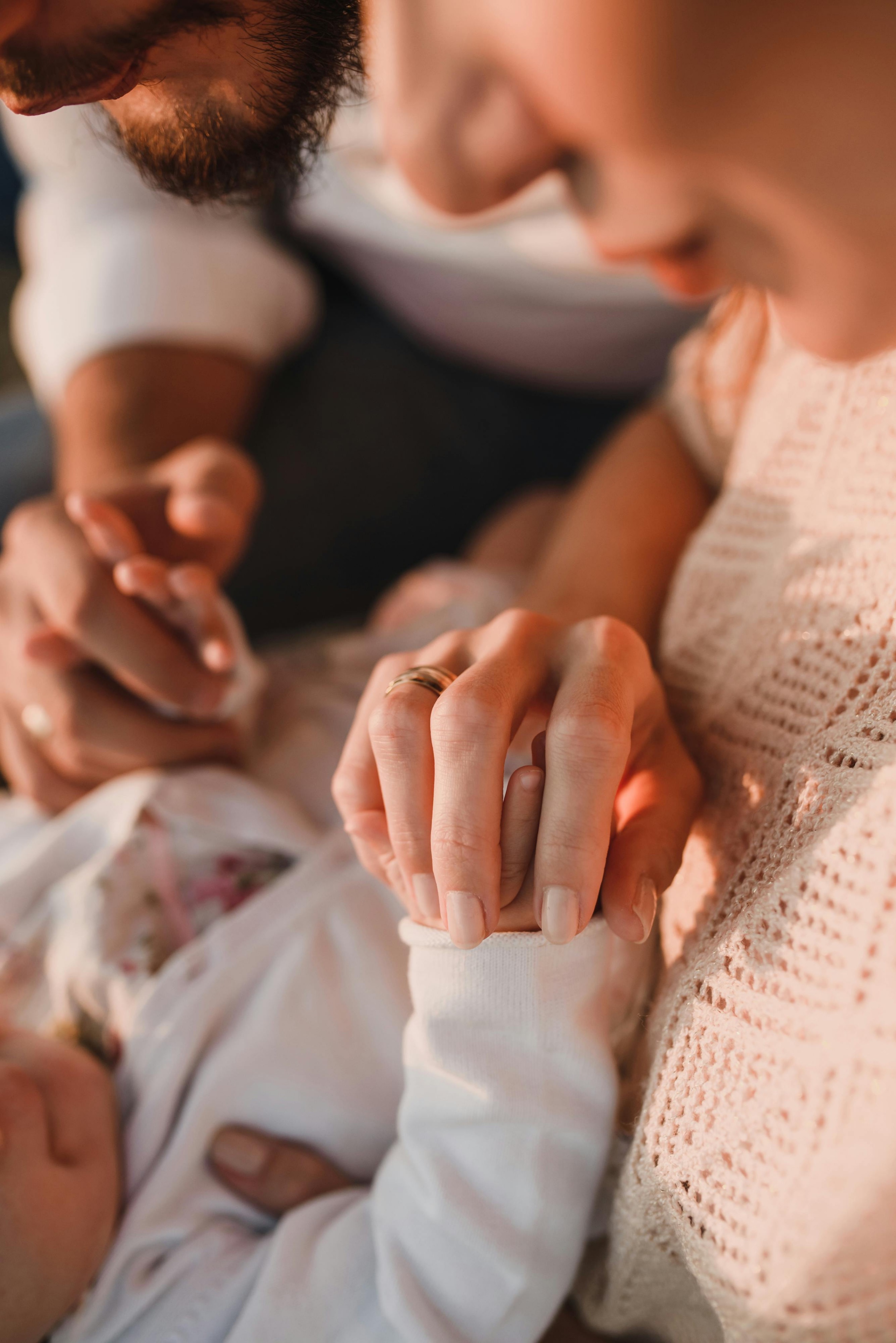 Parents holding their newborn baby